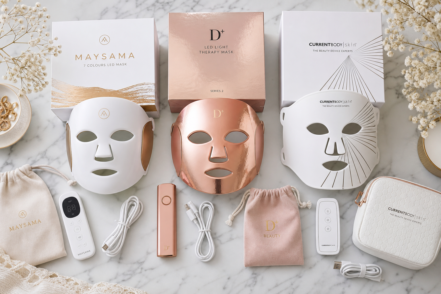 Comparatif des meilleurs masques LED visage 2026 disposés sur surface marbre